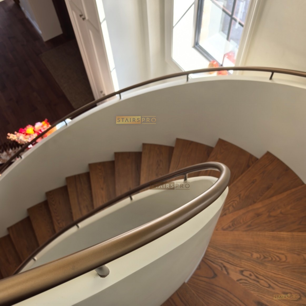 Curved staircase with solid hardwood treads Curved staircase with solid hardwood treads