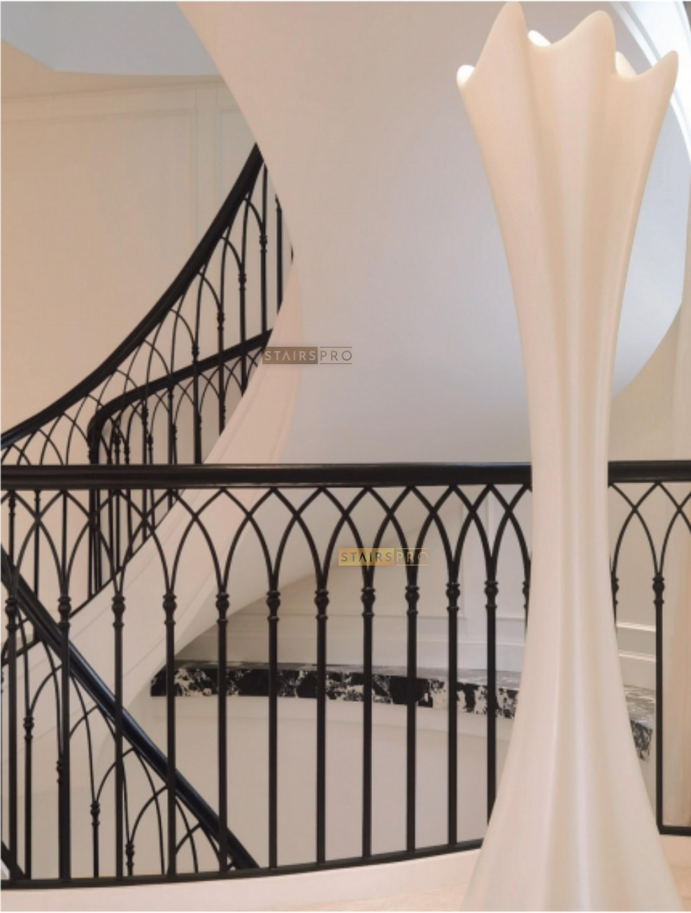 Wrought iron balustrade with repeating forged bar detail
