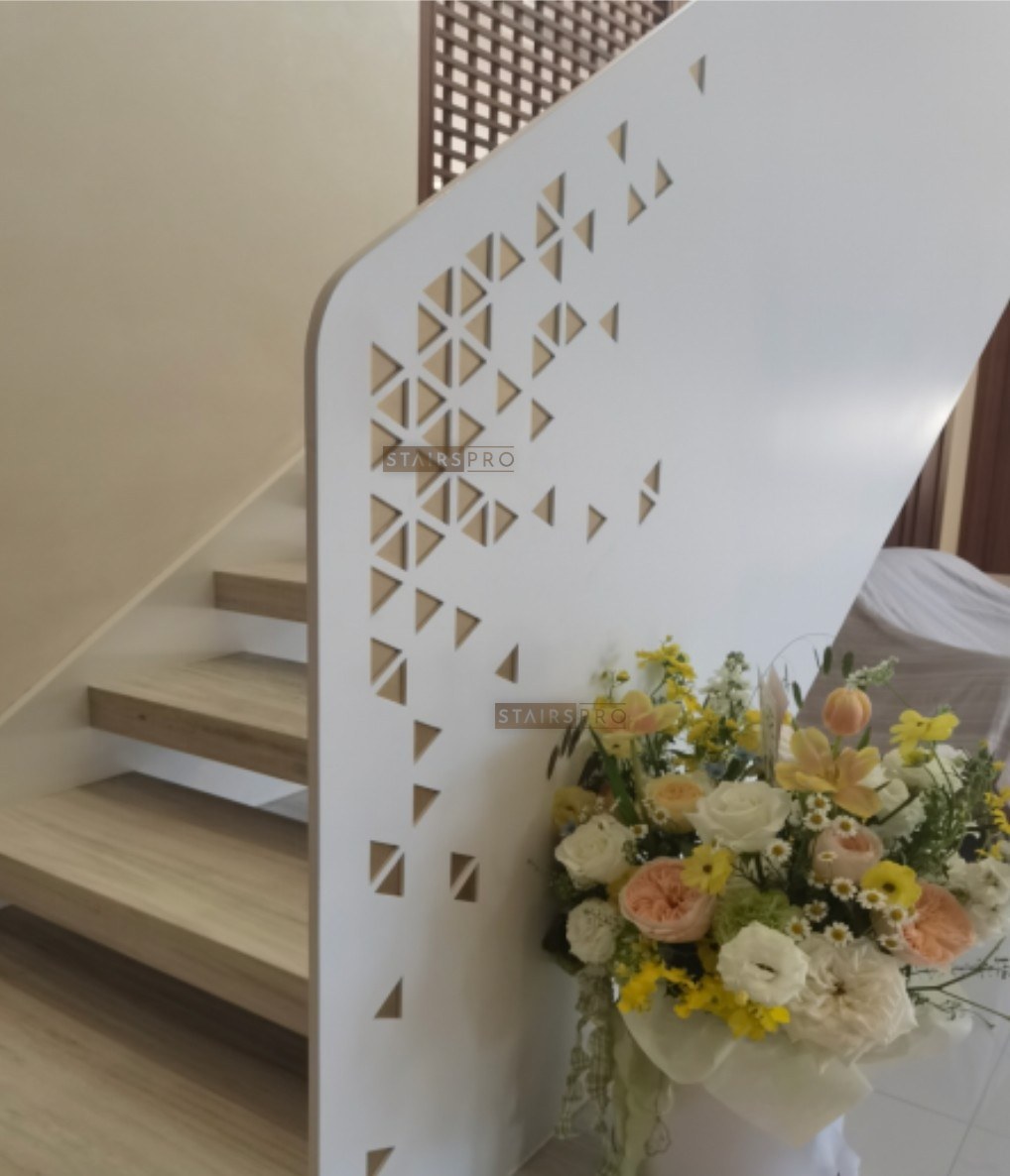 Laser cut steel railing panel with a geometric cut pattern