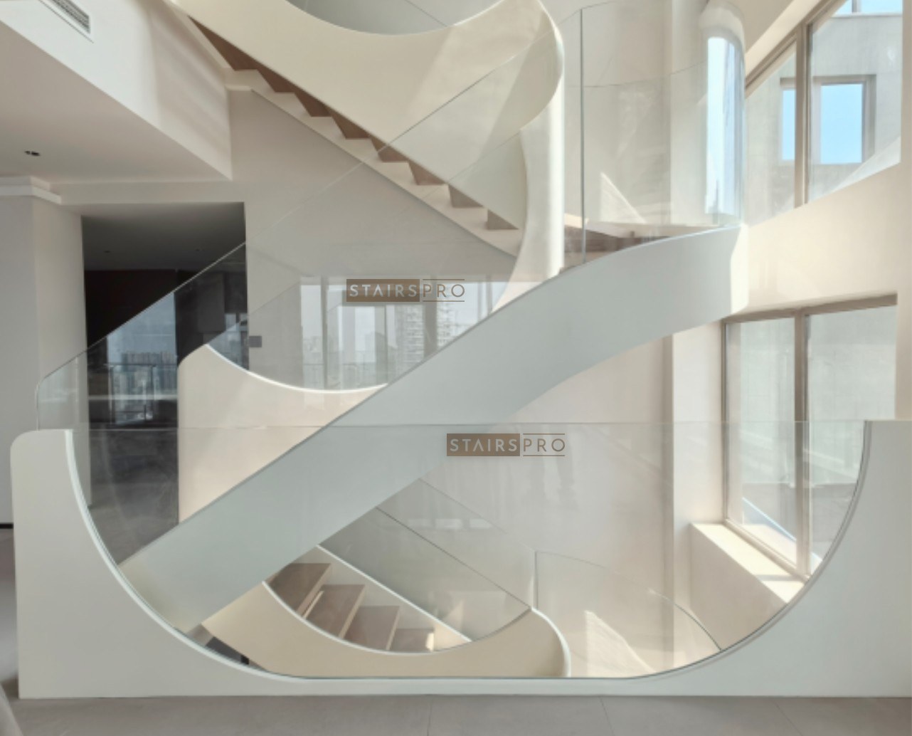 White sculptural laser cut steel staircase balustrade
