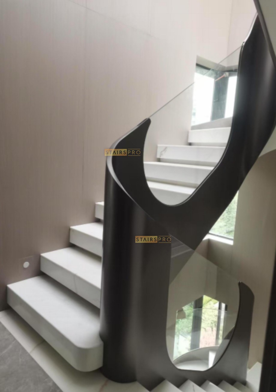 Black sculptural laser cut steel staircase railing